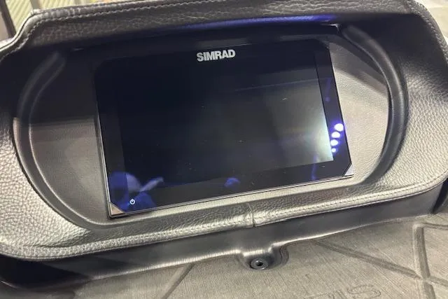 Slide: The Image of Simrad display on 2026 Harris Sunliner 230 dashboard, featuring sleek design and modern technology. - 18