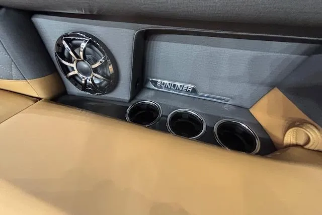Slide: The Image of 2026 Harris Sunliner 230 interior with speaker and cup holders. - 27