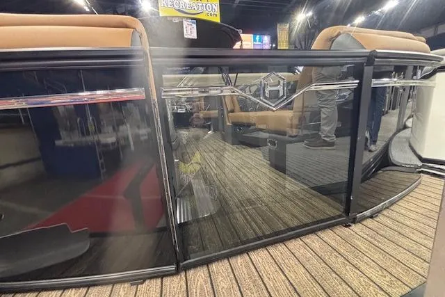 Slide: The Image of 2026 Harris Sunliner 230 pontoon boat with sleek design and comfortable seating. - 5