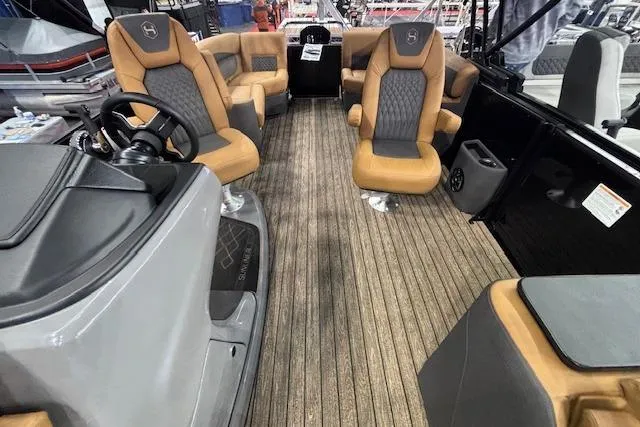 Slide: The Image of 2026 Harris Sunliner 230 interior with luxurious seating and modern design. - 9