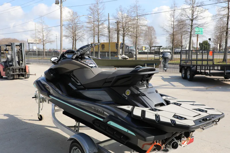 Slide: The Image of 2025 Yamaha WaveRunner FX HO on trailer, parked outdoors under clear sky. - 10