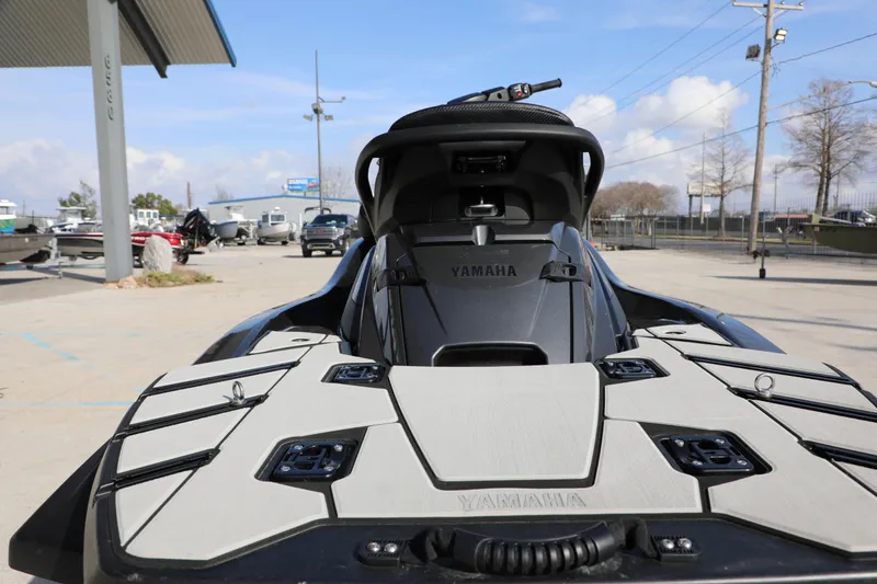 Slide: The Image of 2025 Yamaha WaveRunner FX HO jet ski displayed outdoors, showcasing sleek design and features. - 13