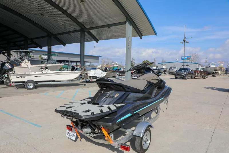 Slide: The Image of 2025 Yamaha WaveRunner FX HO on trailer at a boat dealership. - 4