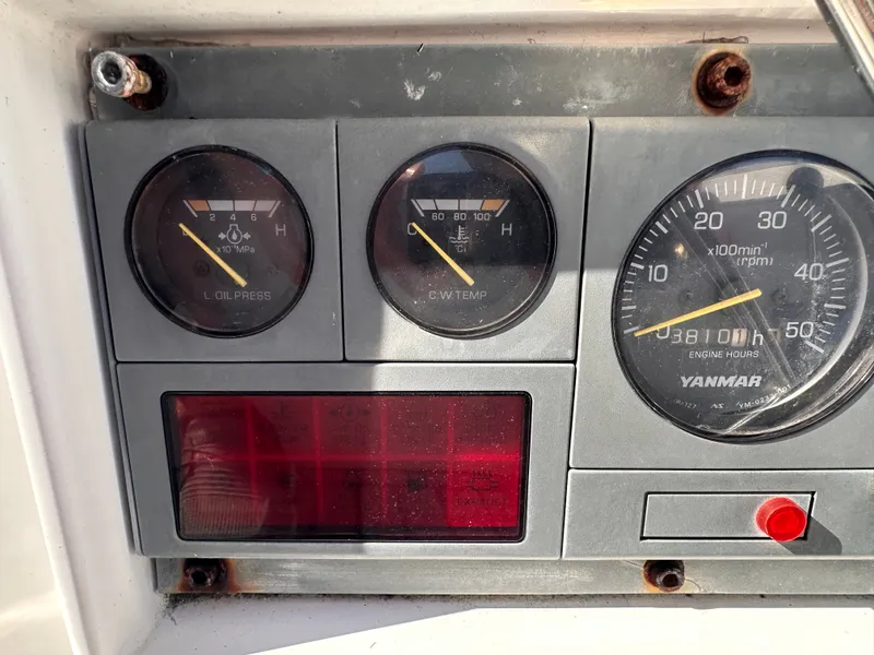 Slide: The Image of Dashboard of a 2002 Northwind 58 with Yanmar engine gauges. - 22