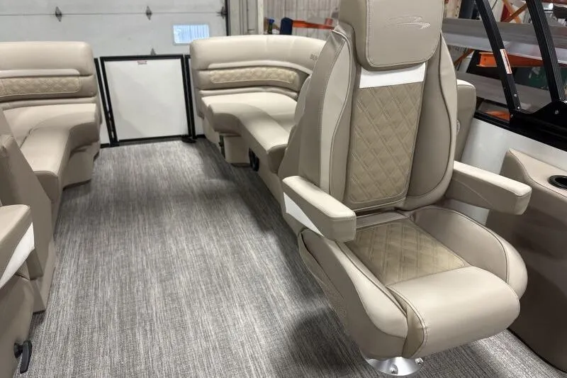 Slide: The Image of Luxurious interior of 2026 Bennington 22 SSRSE pontoon boat with plush seating. - 14
