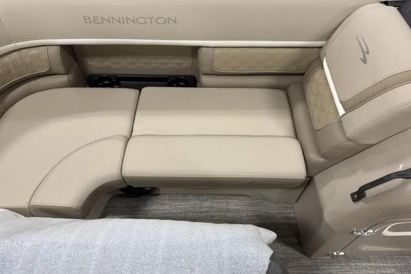 Slide: The Image of 2026 Bennington 22 SSRSE boat interior with luxurious beige seating and elegant design. - 8