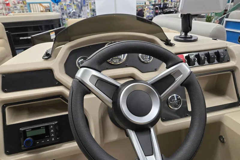 Slide: The Image of Steering wheel and dashboard of 2026 Godfrey EX 2286 SFLX boat. - 10