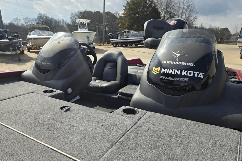 Slide: The Image of 2021 Tracker Pro Team 195 TXW boat with Humminbird and Minn Kota branding. - 10
