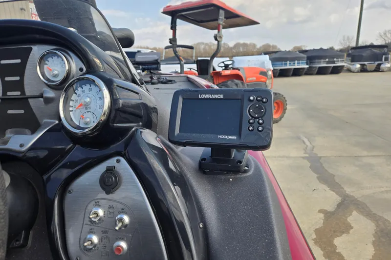 Slide: The Image of 2021 Tracker Pro Team 195 TXW dashboard with Lowrance fish finder and gauges. - 14