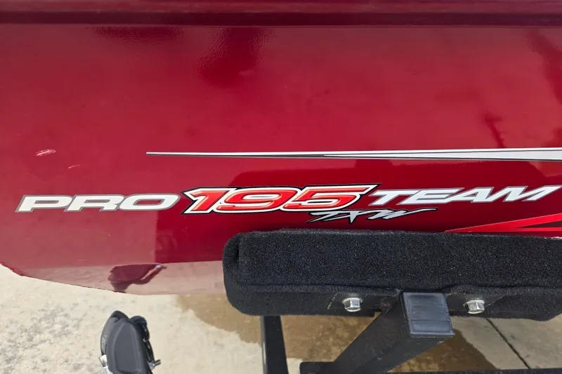 Slide: The Image of Red Tracker Pro Team 195 TXW boat, 2021 model, with bold lettering. - 19