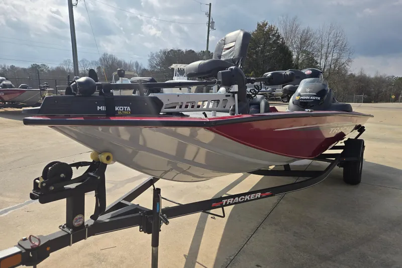 Slide: The Image of 2021 Tracker Pro Team 195 TXW boat on trailer, featuring Minn Kota Ultrex motor. - 5