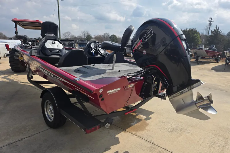 Slide: The Image of 2021 Tracker Pro Team 195 TXW boat with Mercury Pro XS engine on trailer. - 7