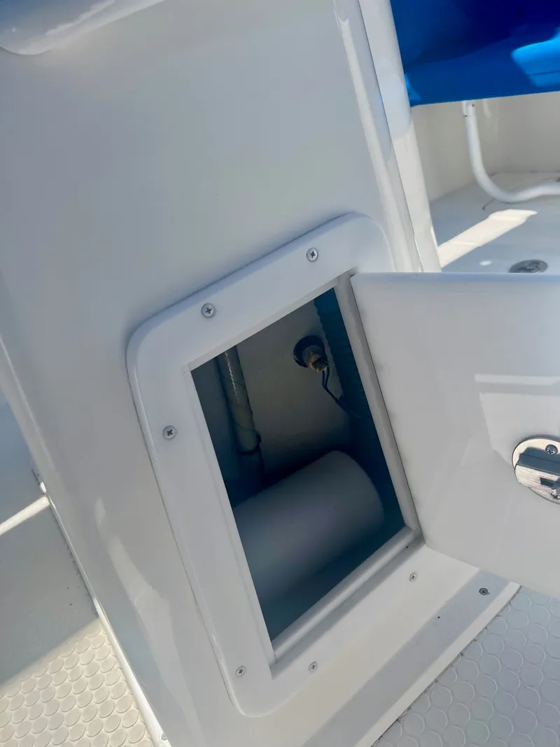 Slide: The Image of Open compartment on a 2006 Concept 27 boat. - 15