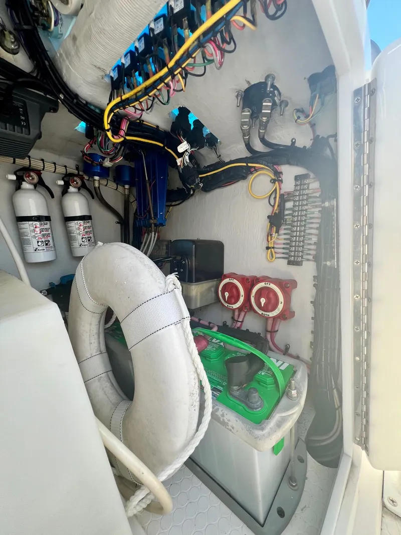 Slide: The Image of Interior of a 2006 Concept 27 boat with life ring and wiring. - 27