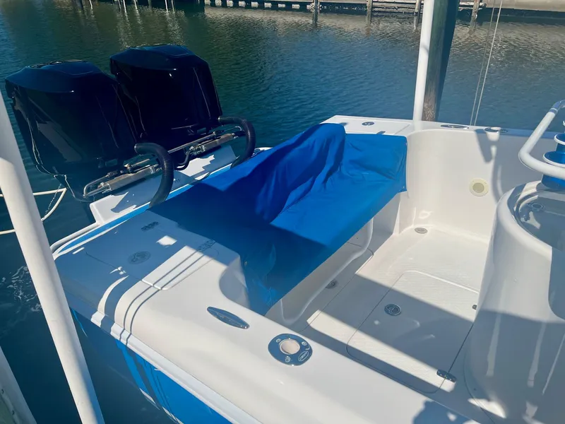 Slide: The Image of 2006 Concept 27 boat with dual outboard engines at dock. - 3