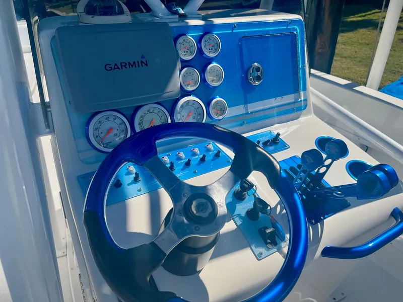 Slide: The Image of 2006 Concept 27 boat helm with Garmin navigation system. - 32