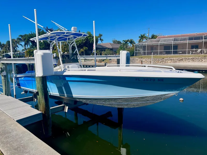 Slide: The Image of 2006 Concept 27 boat docked on a sunny day. - 34