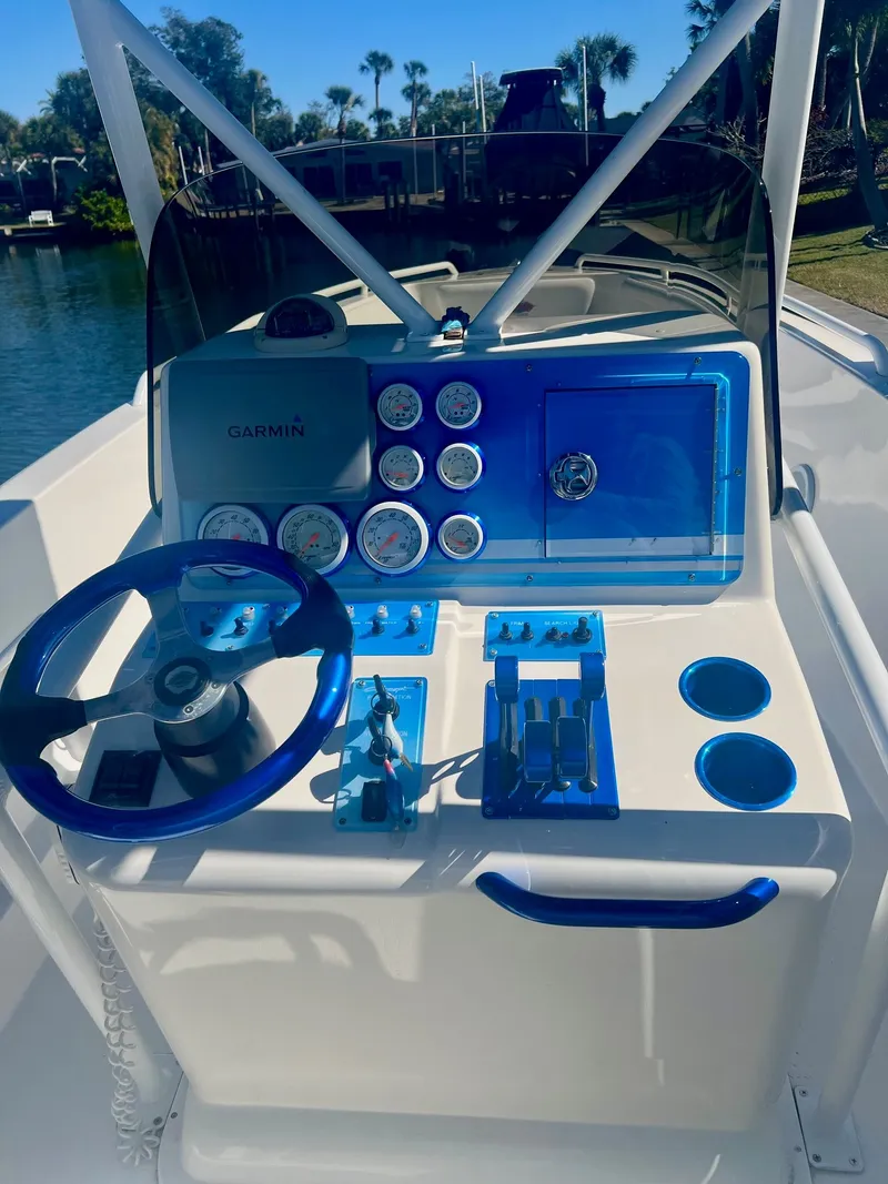 Slide: The Image of Control console of a 2006 Concept 27 boat with Garmin equipment. - 8