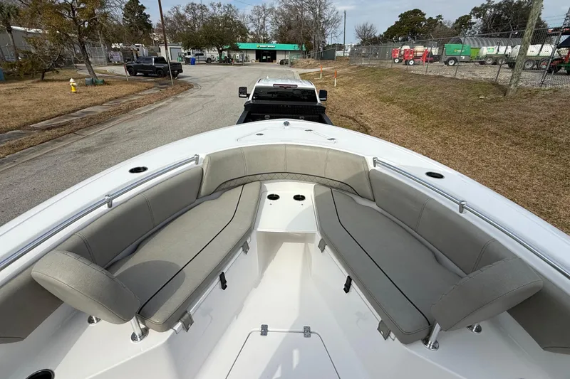 Slide: The Image of 2023 Sportsman Open 232 Center Console boat with spacious seating and sleek design. - 18