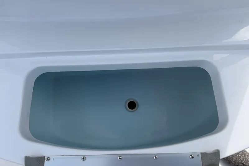 Slide: The Image of 2023 Sportsman Open 232 Center Console livewell interior view. - 28