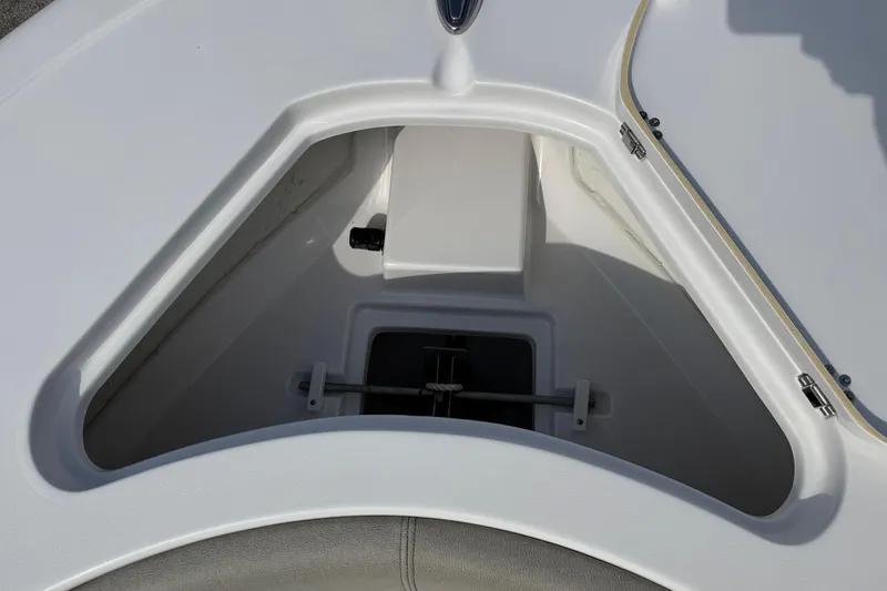 Slide: The Image of 2023 Sportsman Open 232 Center Console boat storage compartment detail. - 31