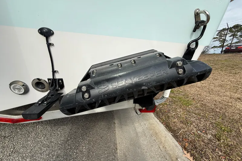 Slide: The Image of 2023 Sportsman Open 232 Center Console with Seakeeper stabilizer on the hull. - 9