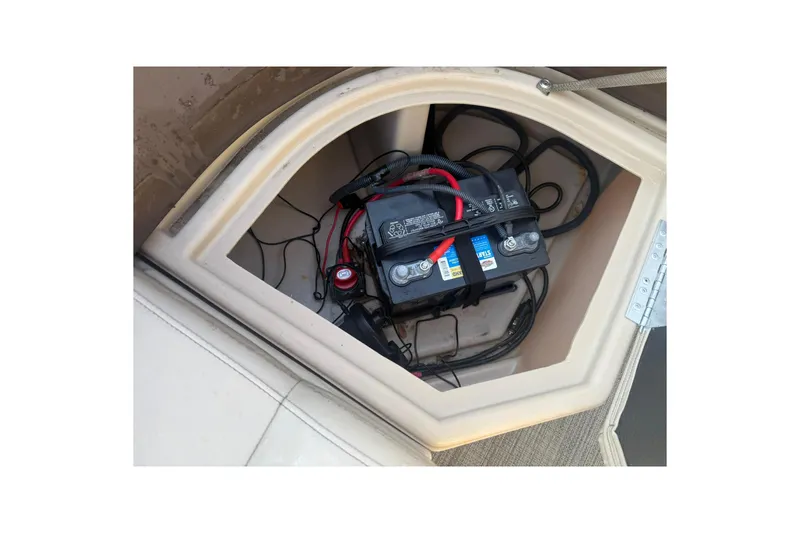 Slide: The Image of Battery compartment of 2023 Bentley Pontoons 240 Navigator boat. - 6