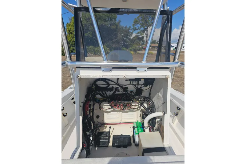 Slide: The Image of 1996 Mako 231 Center Console boat wiring and battery compartment. - 7