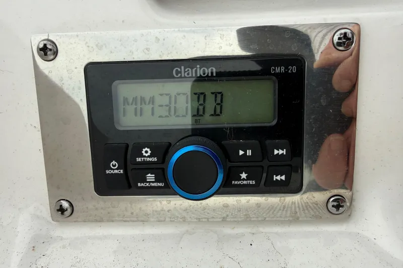 Slide: The Image of Clarion CMR-20 audio system on 2024 Chaparral 21 SSi OB boat dashboard. - 13