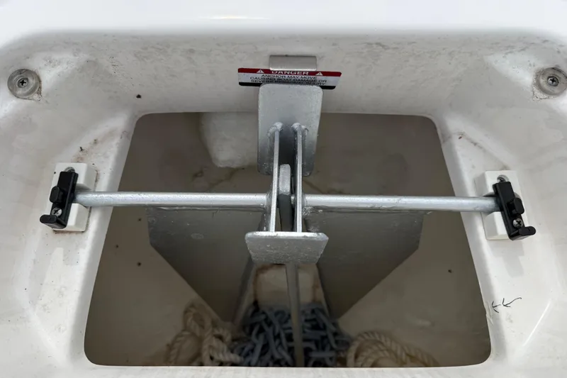 Slide: The Image of Anchor storage compartment of 2024 Chaparral 21 SSi OB boat. - 30
