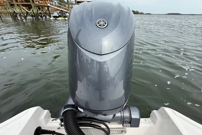 Slide: The Image of 2024 Chaparral 21 SSi OB boat with Yamaha outboard motor on water. - 6
