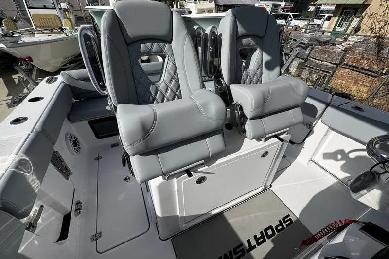 Slide: The Image of 2026 Sportsman Heritage 261 Center Console with luxurious seating and modern design. - 23