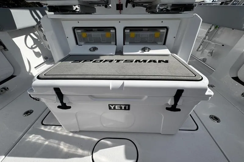 Slide: The Image of 2026 Sportsman Heritage 261 Center Console with Yeti cooler on deck. - 27