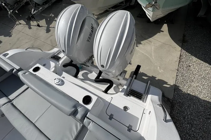 Slide: The Image of 2026 Sportsman Heritage 261 Center Console with dual Yamaha outboard engines. - 32