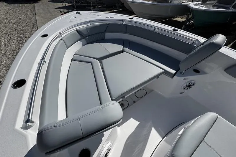 Slide: The Image of 2026 Sportsman Heritage 261 Center Console boat with spacious seating area. - 8