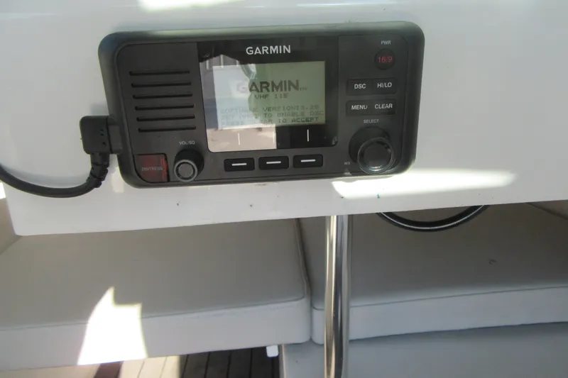Slide: The Image of Garmin VHF radio in 2024 Parker 2320 SL Sport Cabin boat interior. - 32