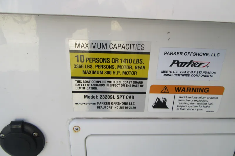 Slide: The Image of 2024 Parker 2320 SL Sport Cabin capacity label, 10 persons, 3366 lbs, 300 HP motor. - 37