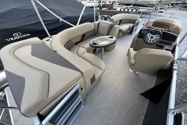 Slide: The Image of 2026 Sylvan Mirage 820 CRS pontoon boat interior with luxurious seating and modern dashboard. - 8