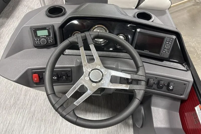 Slide: The Image of Steering console of 2026 Bennington 22 SSRSF boat with modern controls and gauges. - 13