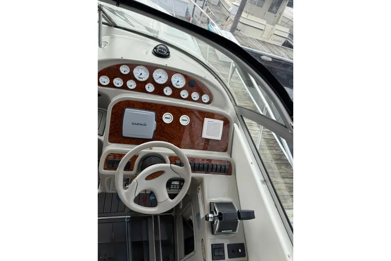 Slide: The Image of Cockpit of 2000 Bayliner 3055 Ciera Sunbridge with Garmin navigation system and control panel. - 10