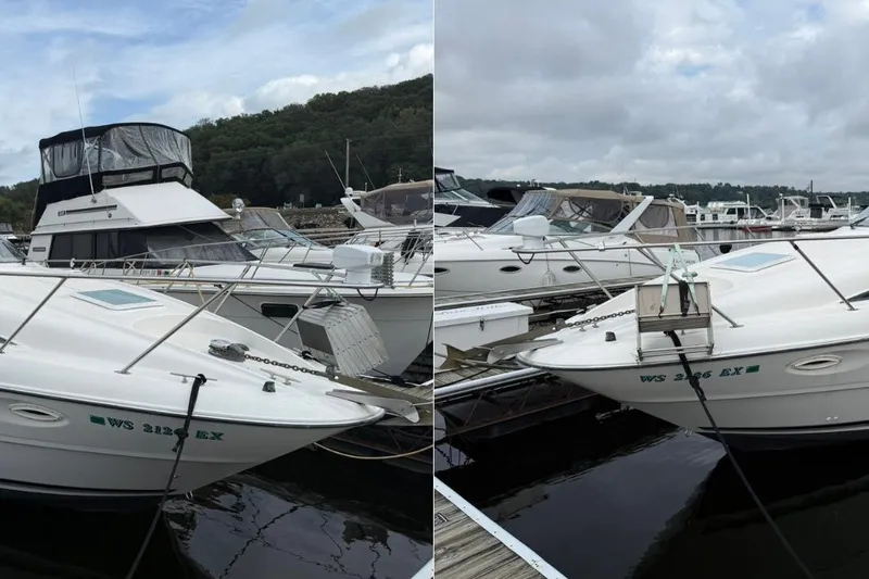 Slide: The Image of 2000 Bayliner 3055 Ciera Sunbridge DX/LX docked at marina, surrounded by other boats. - 5