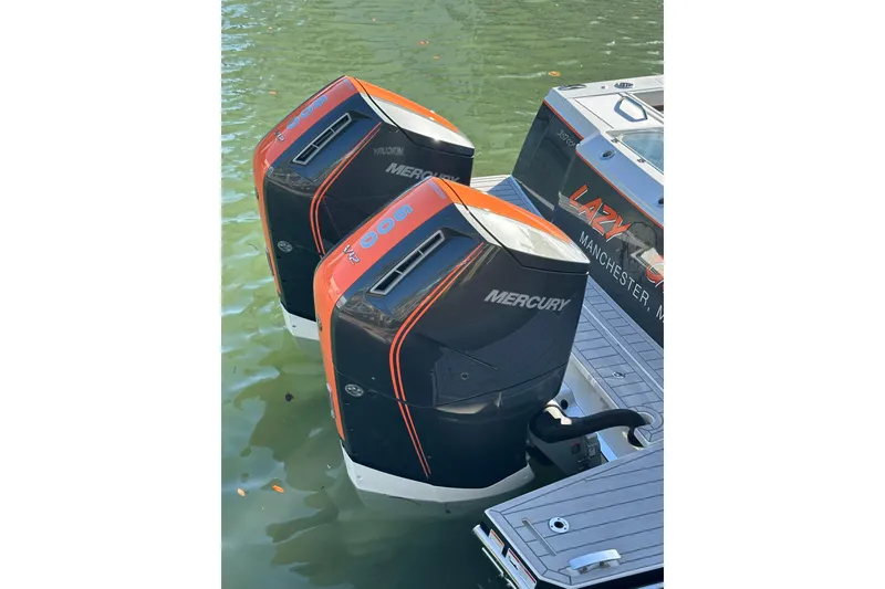 Slide: The Image of Twin Mercury outboard engines on 2024 Formula 387 Center Console Fish boat. - 10