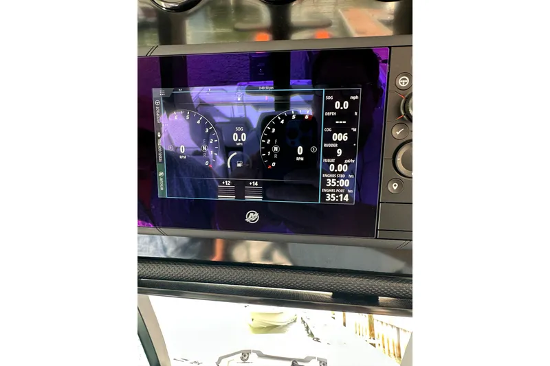 Slide: The Image of Dashboard of 2024 Formula 387 Center Console Fish boat with digital display. - 21
