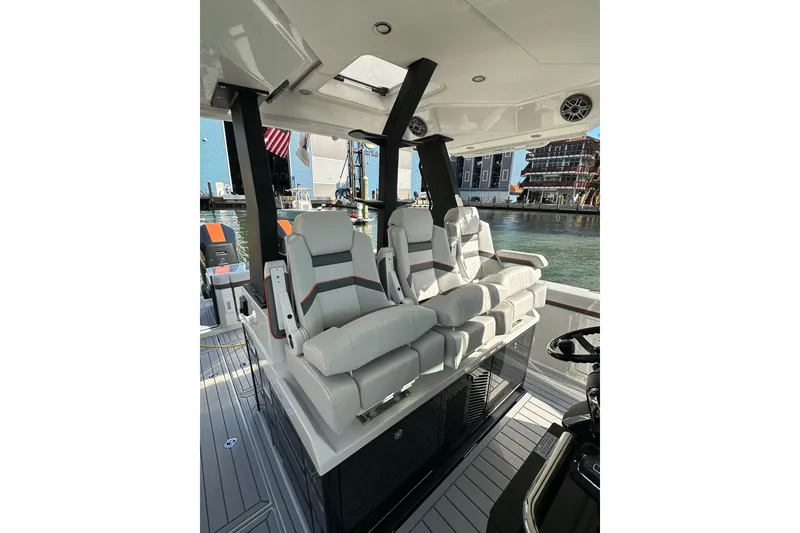 Slide: The Image of 2024 Formula 387 Center Console Fish boat interior with luxurious seating and modern design. - 22