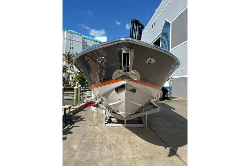 Slide: The Image of 2024 Formula 387 Center Console Fish boat docked, showcasing sleek design and modern features. - 23