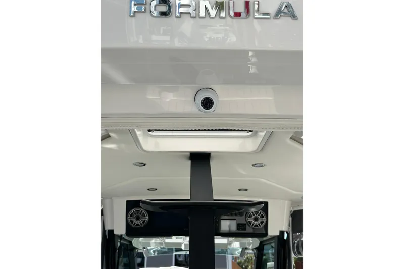 Slide: The Image of 2024 Formula 387 Center Console Fish boat interior with speakers and sleek design. - 40