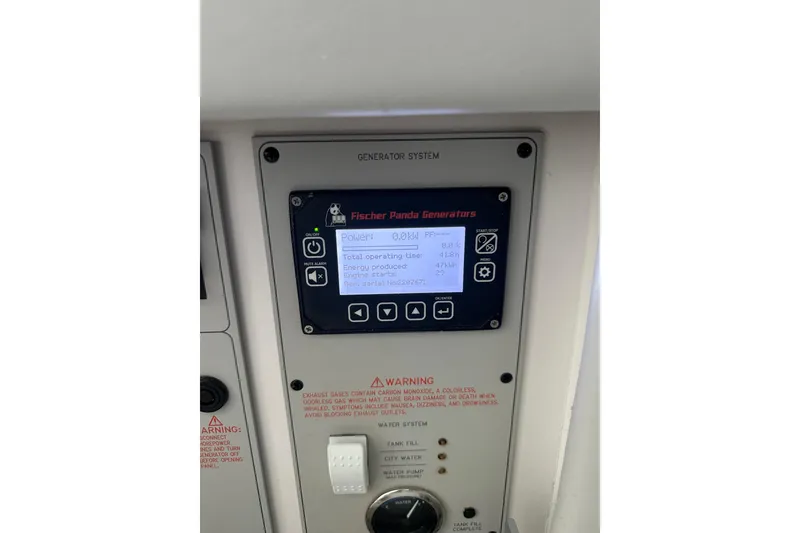 Slide: The Image of 2024 Formula 387 Center Console Fish generator system display panel with Fischer Panda Generators. - 44