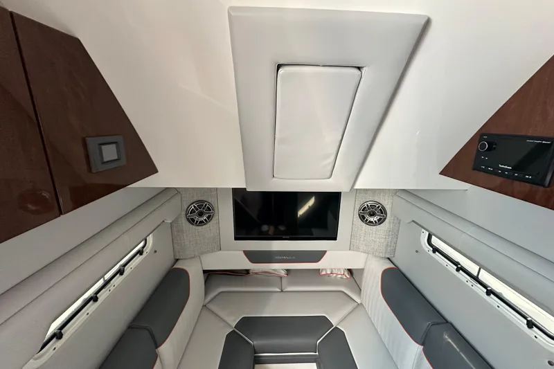 Slide: The Image of 2024 Formula 387 Center Console Fish cabin interior with modern amenities and sleek design. - 47