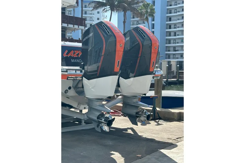 Slide: The Image of 2024 Formula 387 Center Console Fish with dual Mercury outboard engines. - 5