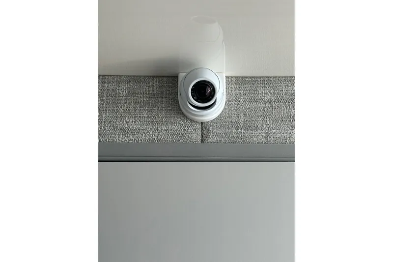 Slide: The Image of Security camera installed on a textured wall in a 2024 Formula 387 Center Console Fish. - 54